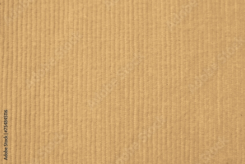 soft light yellow corduroy fabric texture used as background. clean fabric background of soft and smooth textile material. cloth, velvet, .luxury yellow pastel tone for silk.