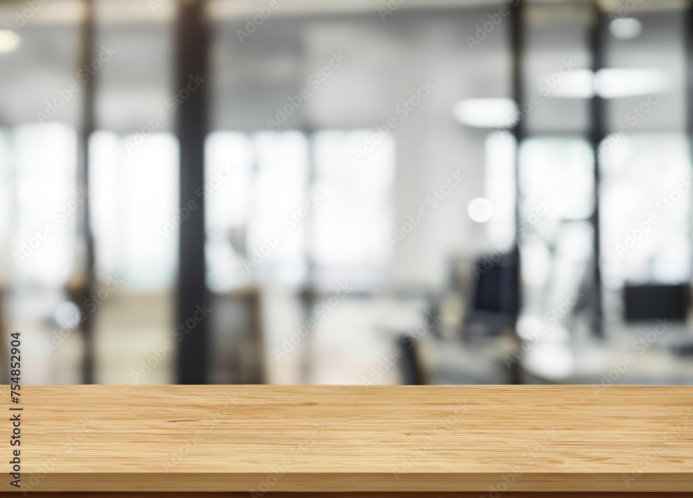 Wood table top and blurred office interior space Wood table top and blurred office interior space