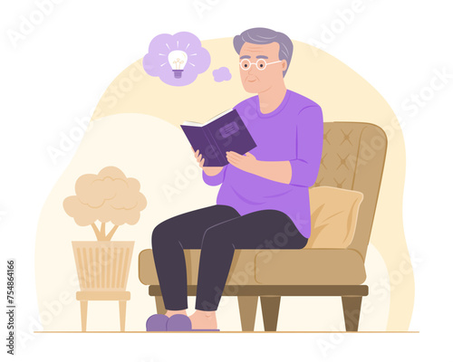 Elderly Man Sitting on Sofa and Reading a Book in Living Room
