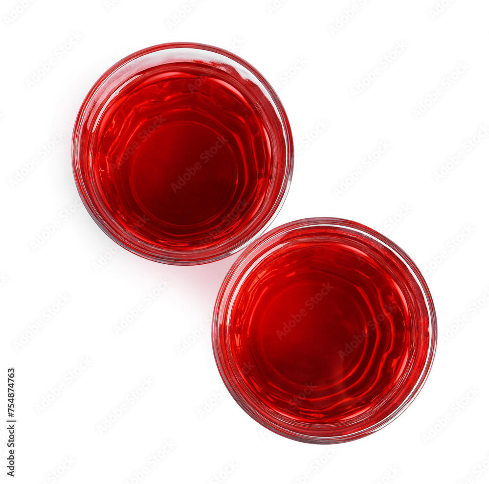 Tasty cranberry juice in glasses isolated on white, top view Tasty cranberry juice in glasses isolated on white, top view