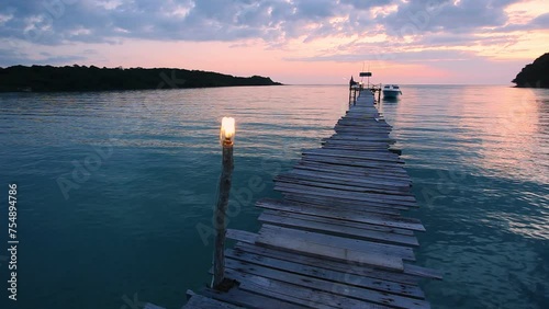 Sunset on the beach and pier at  Koh Kood island