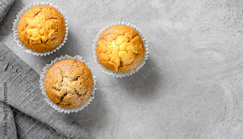 muffin. top view shot of muffins on grey background, copy space muffin. top view shot of muffins on grey background, copy space
