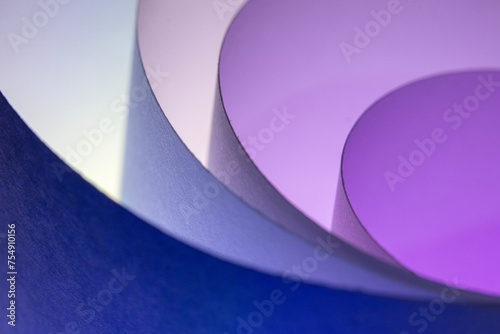 When I roll paper into many circles, I create a background with a sheet of paper and lights made up of different colors.
