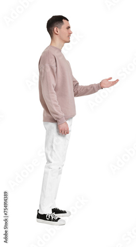 Handsome young man greeting someone on white background