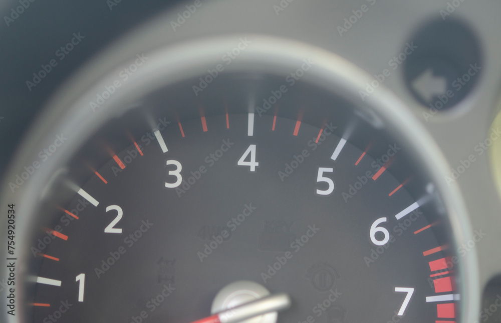 car speedometer with revolutions and number of kilometers per hour, as a concept of speed car speedometer with revolutions and number of kilometers per hour, as a concept of speed