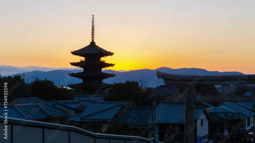 timelapse kyoto city aerial skyline view to ancient Yasaka pagoda building and Kyoto Tower at the back in higashiyama, Kyoto old town with sunset sky timelapse kyoto city aerial skyline view to ancient Yasaka pagoda building and Kyoto Tower at the back in higashiyama, Kyoto old town with sunset sky