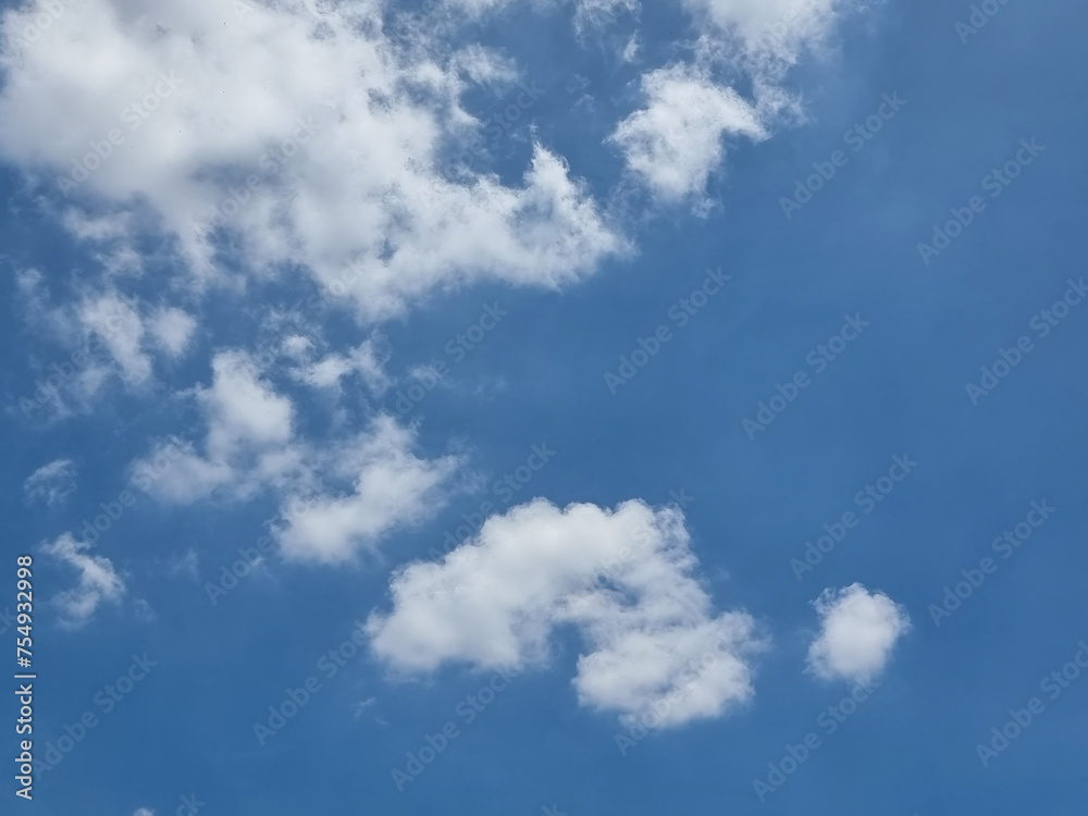 abstract blue sky high white group shape cirrostratus clouds background in summer gradient light beauty background. beautiful bright cirrostratus cloud and calm fresh wind air abstract blue sky high white group shape cirrostratus clouds background in summer gradient light beauty background. beautiful bright cirrostratus cloud and calm fresh wind air