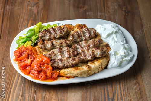 White Plate With Meat and Vegetables