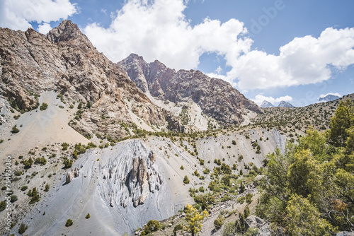 Mountain landscape of the Fan Mountains with rocks, stones and vegetation in Tajikistan, mountain panorama photo