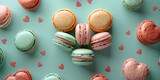 Colorful macarons heart shape arrangement on blue background for sweet and romantic concept design