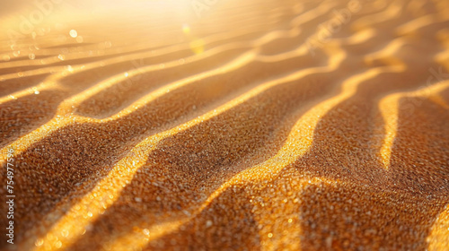 The sand is golden and has a lot of texture. The sun is shining on it, making it look warm and inviting