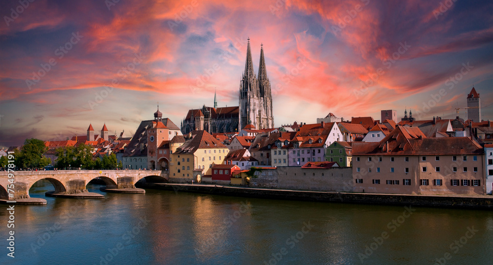 Naklejka premium German Old Town Regensburg with sunset at the river danube