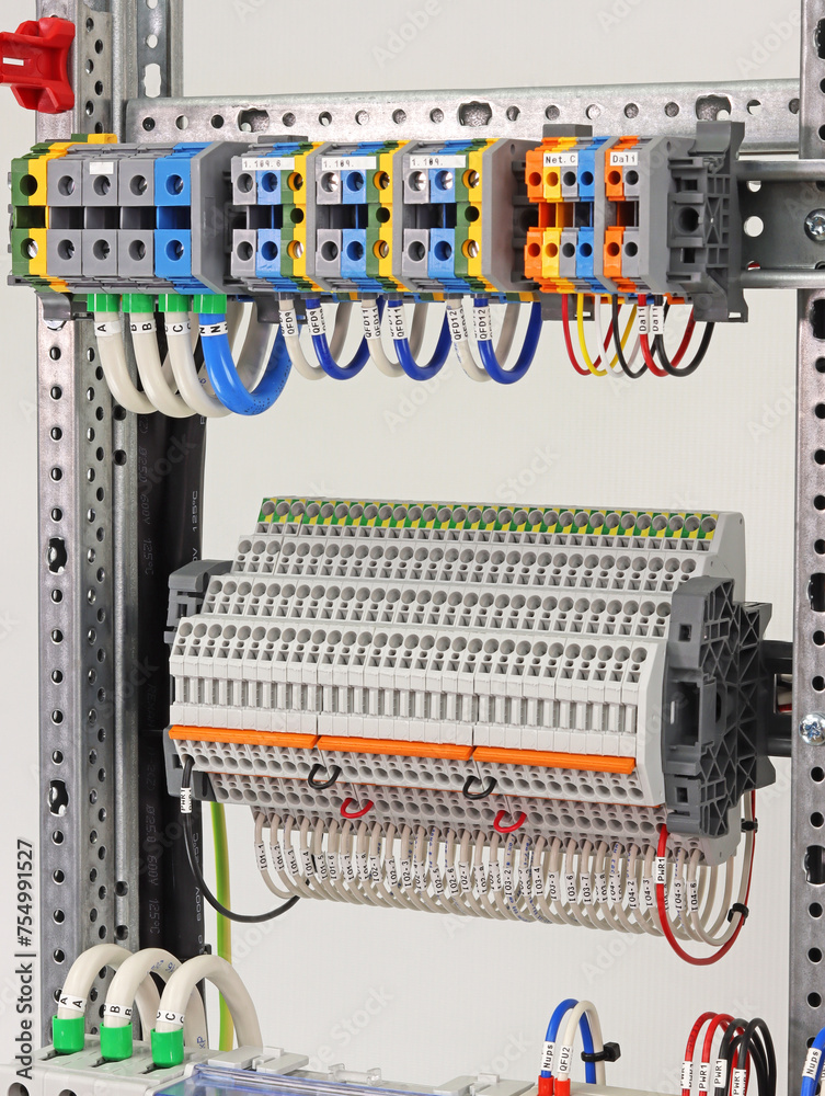Electrical pass-through terminals for connecting copper mounting wires in an electrical distribution cabinet.