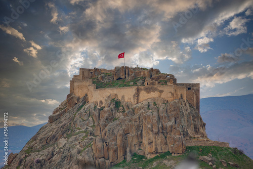 Pertek castle (Pertek kalesi) located in Pertek district of Tunceli province and bearing the name of the district is located on a mountain in the middle of Keban Dam (Keban baraji). photo