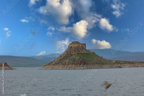 Pertek castle (Pertek kalesi) located in Pertek district of Tunceli province and bearing the name of the district is located on a mountain in the middle of Keban Dam (Keban baraji). photo