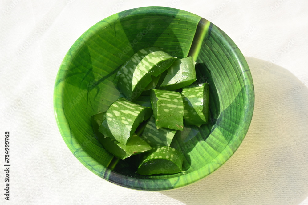 Aloe vera slices. Many Ayurvedic medicines are made using its juice. Its make topical medications for skin conditions, such as burns, wounds, frostbite, rashes, psoriasis, cold sores, or dry skin.
Aloe vera slices. Many Ayurvedic medicines are made using its juice. Its make topical medications for skin conditions, such as burns, wounds, frostbite, rashes, psoriasis, cold sores, or dry skin.
