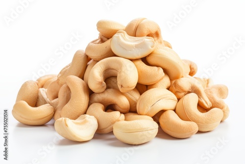 Cashew nuts on a white isolated background.