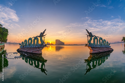 West Lake Dragons statue in Hanoi in early morning © VietDung