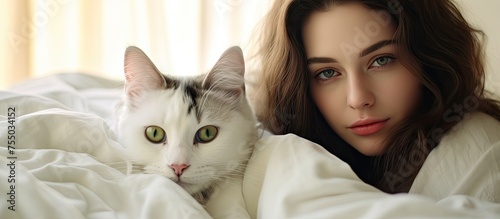 Tranquil woman lying in bed...