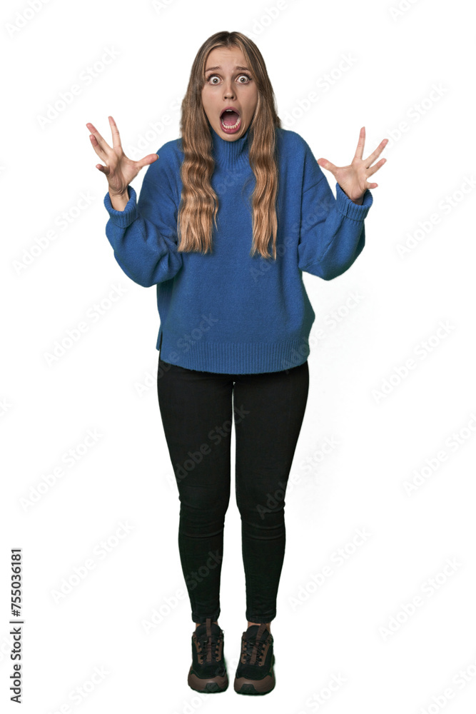 Studio portrait of a blonde Caucasian woman screaming to the sky, looking up, frustrated. Studio portrait of a blonde Caucasian woman screaming to the sky, looking up, frustrated.