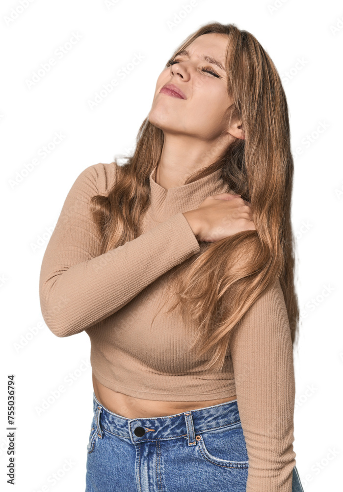 Studio portrait of a blonde Caucasian woman having a shoulder pain. Studio portrait of a blonde Caucasian woman having a shoulder pain.