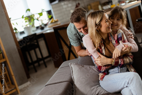 Cozy family bonding moment in a warm living room