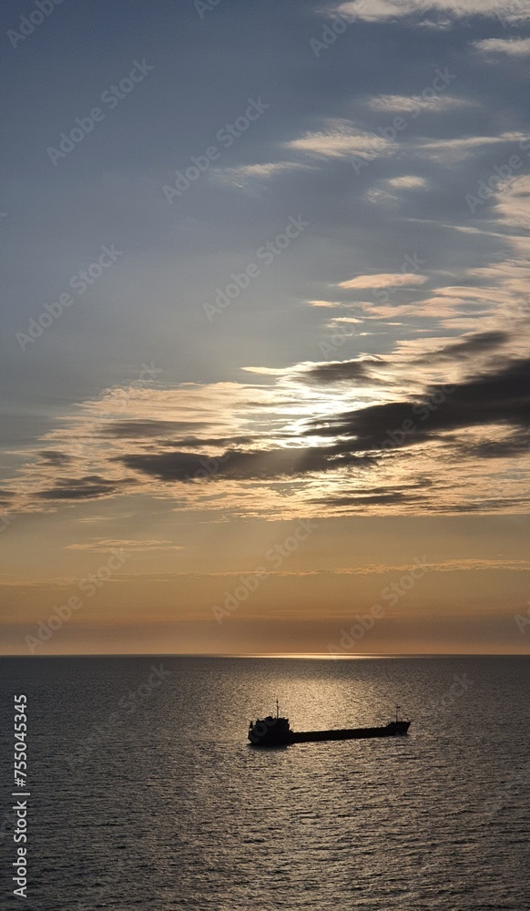 sunset on the sea and ship