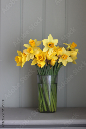 Easter greeting card. Bouquet of golden daffodils.
Easter season concept.