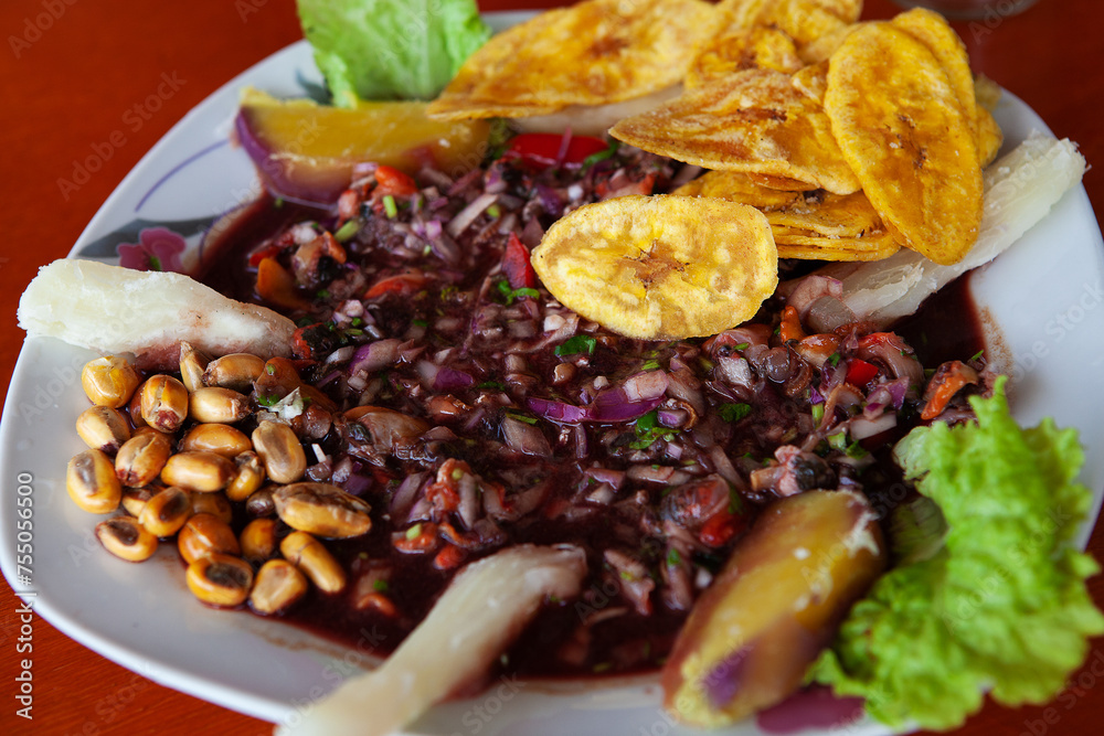 Cebiche de conchas negras, or Peruvian Black Shell Ceviche, is a ...