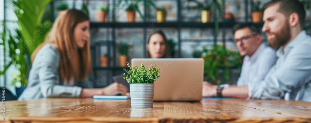 Group of office workers gather around a table to do research and implement new ideas. Business people discussing in board room meeting Group of office workers gather around a table to do research and implement new ideas. Business people discussing in board room meeting