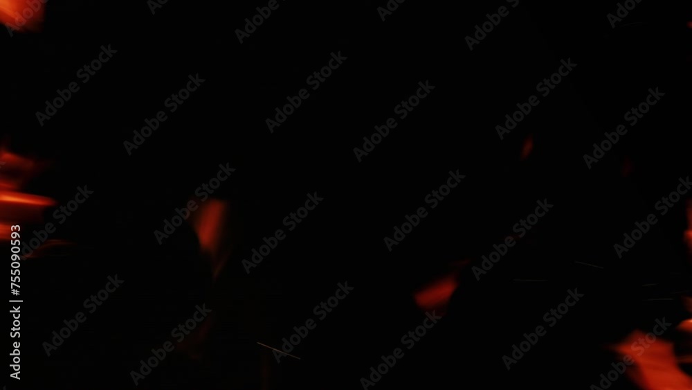 Vertical fire frame flame sparks orange hot black Vertical fire frame flame sparks orange hot black