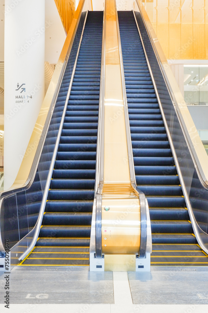Modern luxury Escalators in an office building or shopping mall, escalator in the subway or airport. Modern luxury Escalators in an office building or shopping mall, escalator in the subway or airport.