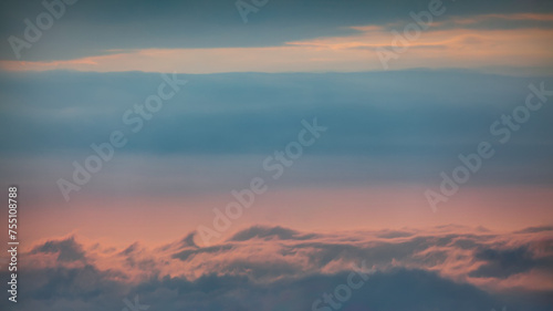Romantic tranquil sky with clouds at beautiful sunset as natural background © rasica