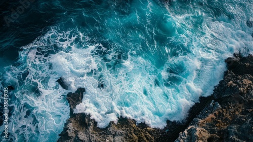 Aerial View of Ocean Waves and Rocks