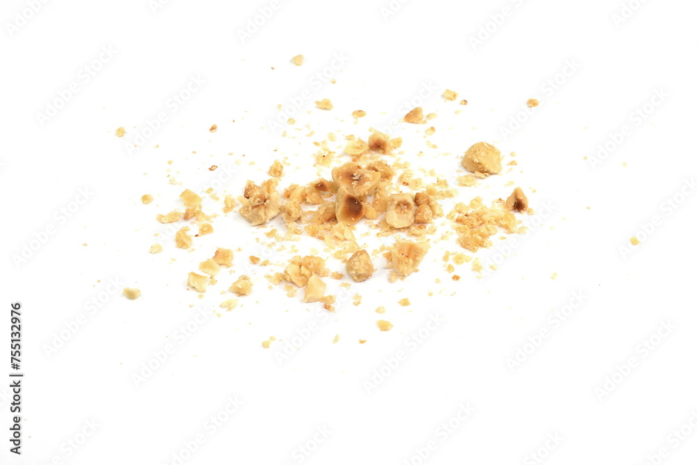 Ground, milled, crushed or granulated hazelnut pile isolated on white background Ground, milled, crushed or granulated hazelnut pile isolated on white background