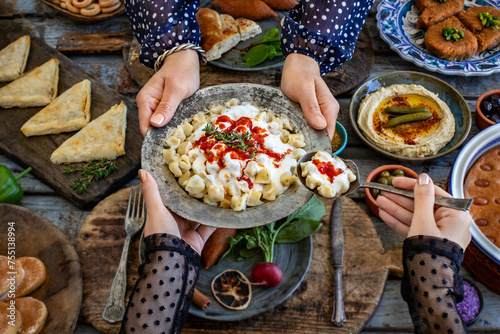 Manti or mantı at the hands of two woman