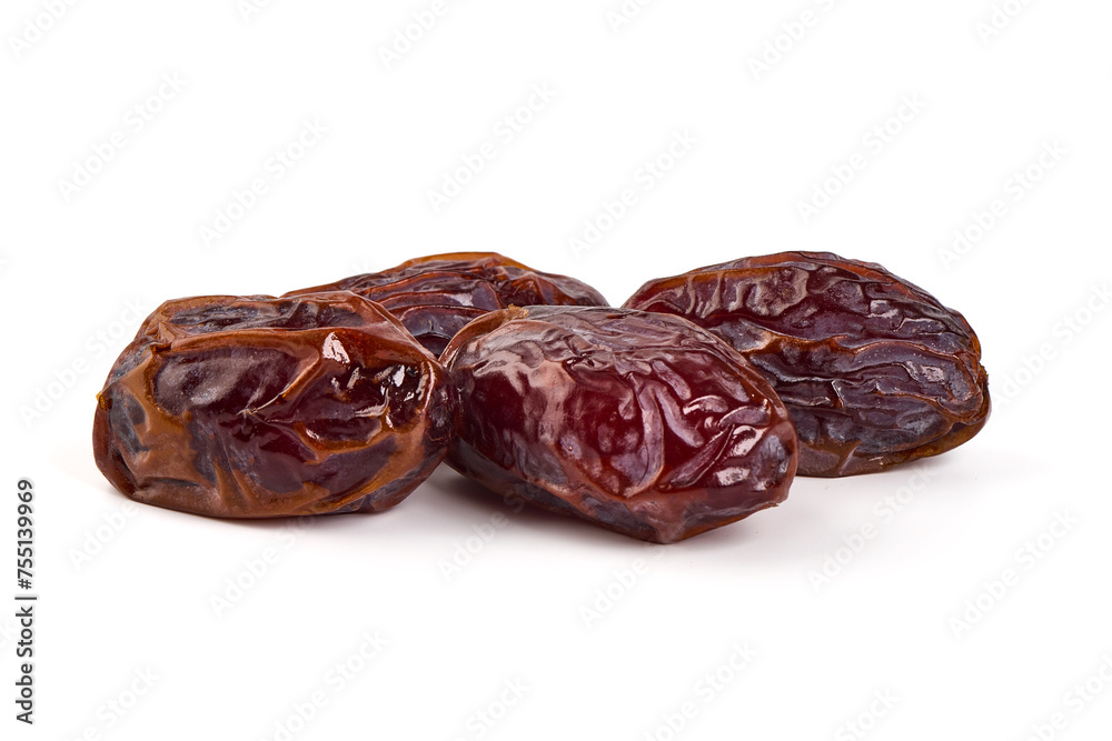 Raw Organic Medjool Dates, isolated on white background.