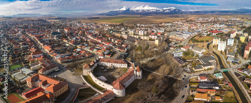 The town of Kezmarok with views of High Tatras, Slovakia photo