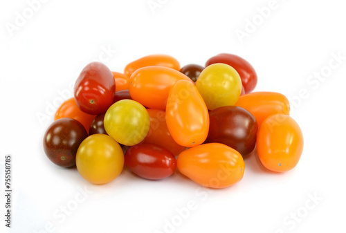 Different sorts of tomatoes isolated on white background.