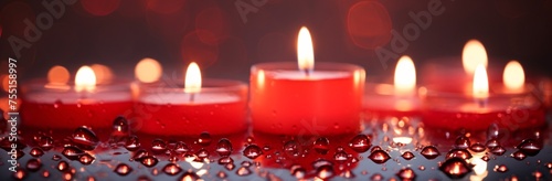 A beautiful background of red candles with drops on them