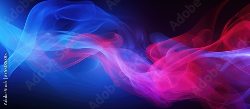 A vivid and intense abstract background with dramatic smoke and fog swirling in contrasting blue and pink colors  creating a mesmerizing visual display.