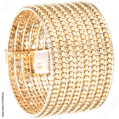 Large gold bracelet on white background