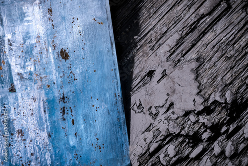 Aquamarine (blue beryl) on schorl (black tourmaline) macro photography detail texture background. From Namibia. close-up raw rough unpolished semi-precious gemstone
 photo