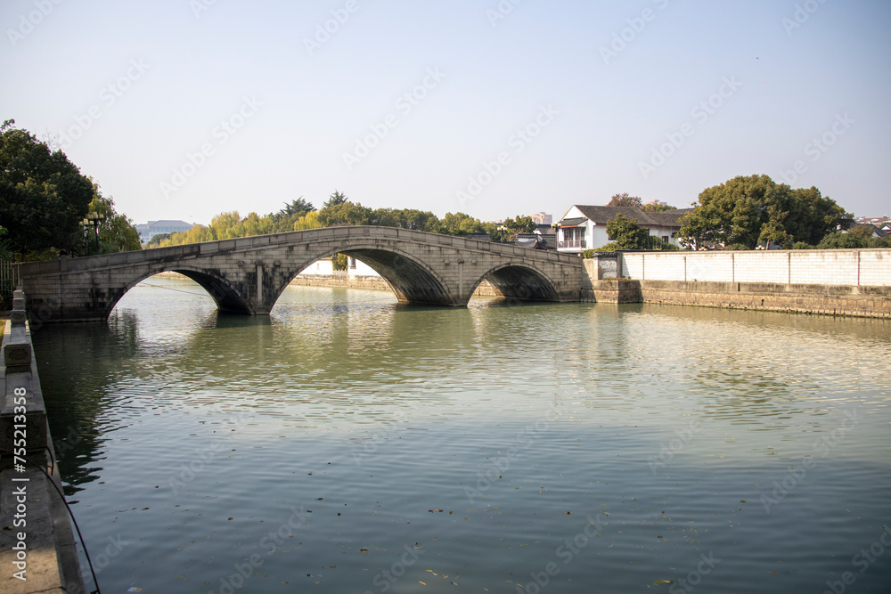Chinese style bridge over the Shangtang river in Suzhou.