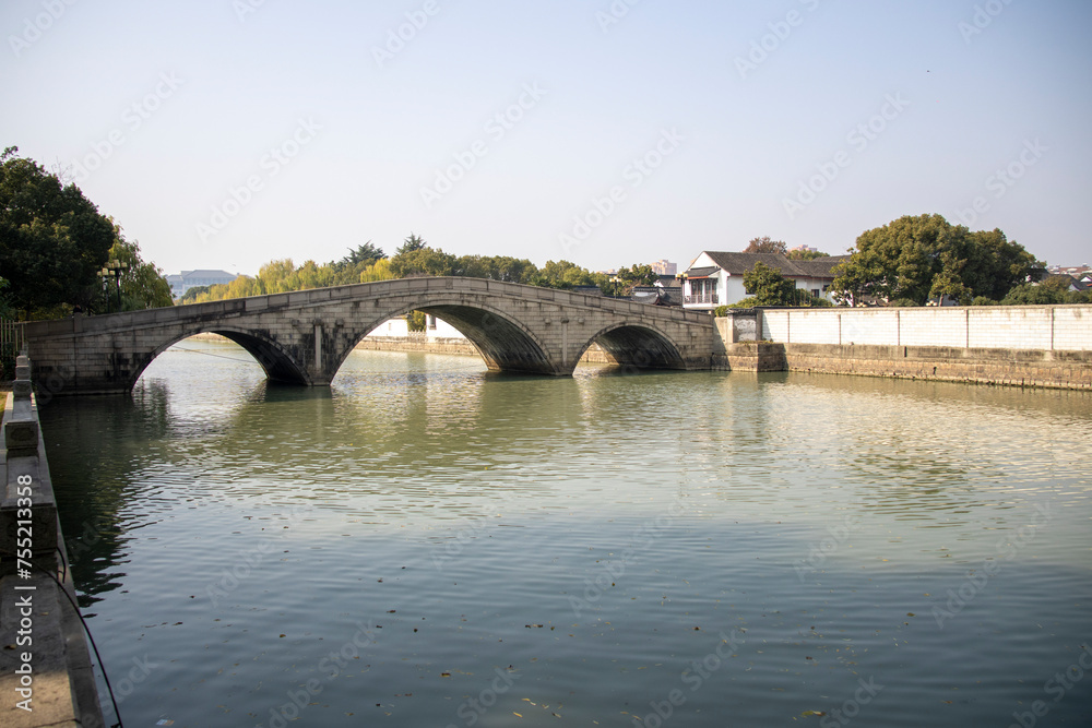 Chinese style bridge over the Shangtang river in Suzhou. Chinese style bridge over the Shangtang river in Suzhou.