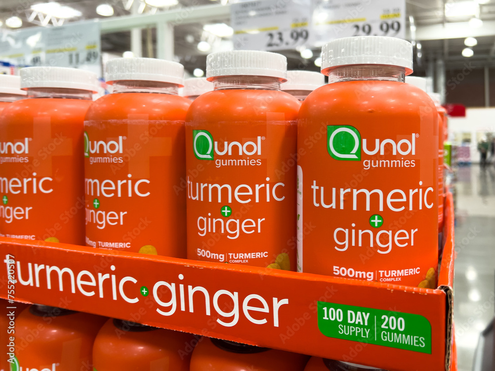 Plastic Jars of Qunol brand turmeric and ginger complex gummies for