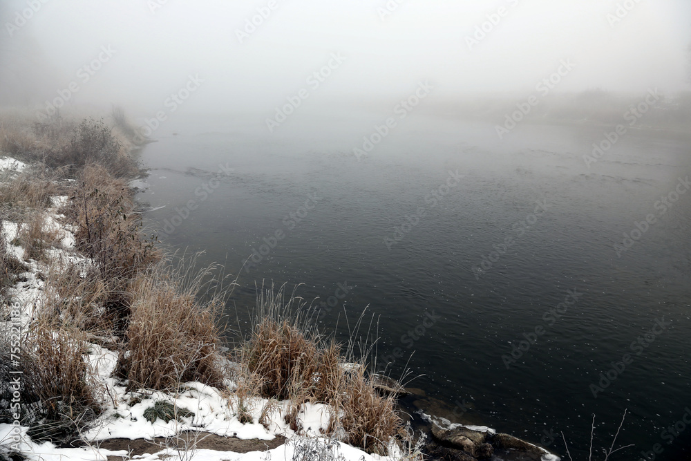 The Grand River in Waterloo, Ontario, Canada, shot during a foggy morning in early spring.