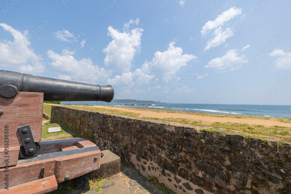 Old colonial artillery cannons on bastion along the coast line of Galle, Southern Province of Sri Lanka