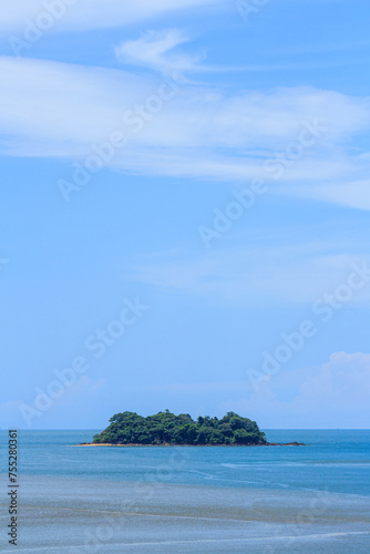 Island in the middle of the sea on a clear day