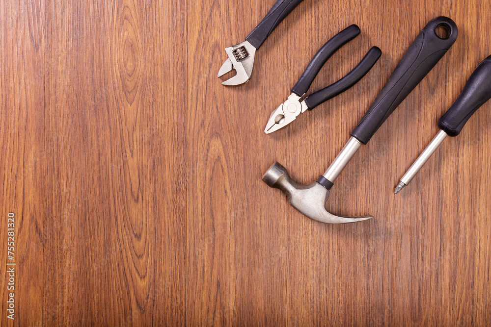 Equipment, tools on wooden background, background on Labor Day Equipment, tools on wooden background, background on Labor Day